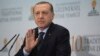 Turkey's President Recep Tayyip Erdogan addresses foreign ambassadors at a Ramadan dinner in Ankara, Turkey, June 6, 2017.