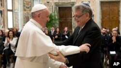 Pope Francis greets Argentine Rabbi Abraham Skorka during a private audience at the Vatican, Feb. 23, 2017.