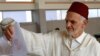 A Moroccan man casts his ballot at a polling station in parliamentary elections, in Rabat, Morocco, Oct. 7, 2016. 