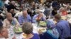People of Different Faiths Unite for Muslim Ramadan Meal