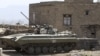 An armored military vehicle is seen near the vicinity of the presidential palace in Sana'a, Yemen, April 2, 2015. 