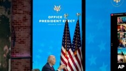 President-elect Joe Biden participates in a virtual meeting with the National Association of Counties Board of Directors about jobs at The Queen theater, Dec. 4, 2020, in Wilmington, Del.