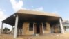 FILE - An exterior view shows the U.S. consulate in Benghazi, Libya, a day after it was attacked and set on fire September 11, 2012.