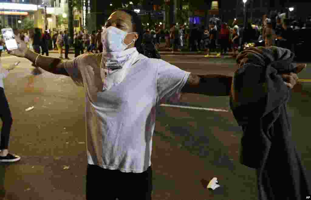 Demonstrators protest Tuesday's fatal police shooting of Keith Lamont Scott in Charlotte, N.C., Sept. 21, 2016.