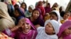 FILE - Pakistani Christian women mourn the death of a man killed in a bombing attack, in Lahore, March 28, 2016. A suicide bombing had targeted Christians gathered on Easter, the day before, in Lahore. Christians frequently complain of being harassed by radicals in Pakistan.