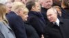  Donald Trump, Angela Merkel, Emmanuel Macron et Vladimir Poutine, centenaire de l'armistice, Paris, le 11 novembre 2018.
