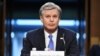 FBI Director Christopher Wray testifies before the Senate Judiciary Committee on Capitol Hill in Washington, March 2, 2021. Wray is condemning the Jan. 6 riot at the Capitol as “domestic terrorism.”