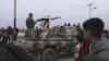 Syrian Kurdish gunmen control the area around Qamishli's airport in northeastern Syria on Dec. 8, 2024, following the fall of the capital Damascus to anti-government fighters.