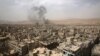 Picture shows smoke billowing from the Syrian rebel-held area of Douma, east of the capital Damascus, following a reported airstrike by Syrian government forces, Sept. 14, 2015