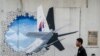 Les familles des disparus indignées par la fin annoncée des recherches du MH370 