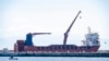 FILE - Russian vessel Lady R docked near Cape Town, South Africa, Dec. 8, 2022. A presidential inquiry in South Africa found government officials didn't know the U.S.-sanctioned ship was assigned to deliver military equipment to the country until the vessel neared national waters