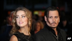 Johnny Depp et Amber Heard à Londres le 11 octobre 2015.