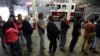 Voters line up at the Engine 26 Ladder 9 firehouse to vote on Election Day in New Orleans, Louisiana, November 6, 2012.