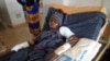 FILE - A man receives treatment at the Jos University teaching hospital in Jos, Nigeria, June 25, 2018, after clashes in central Nigeria between mostly Muslim herders and Christian farmers. 