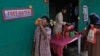 File - A volunteer distributes drinking water next to a bus stand on a hot day in Hyderabad, India, March 21, 2024. Earth just had its warmest March ever recorded, the 10th month in a row to set such a record, according to the European Union climate agency Copernicus. 