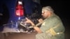 An Iraqi Sunni tribal fighter in Ramadi, the capital of Anbar province, 115 kilometers (70 miles) west of Baghdad, Iraq, early Saturday, May 16, 2015.